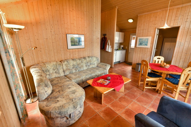 Ferienhaus in Pelzerhaken - Ferienhaus Typ C im Ferienpark AM WALDRAND - Wohnraum mit Ecksofa